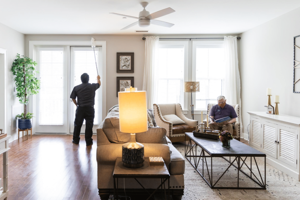 housekeeping cleaning a resident room