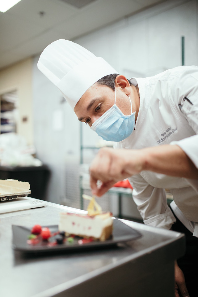 Chef Marco plating dessert