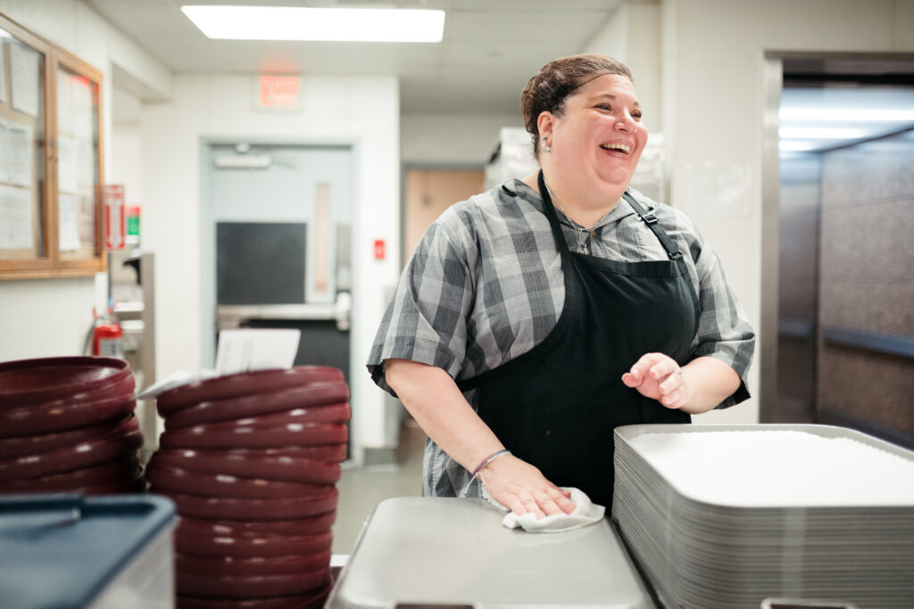 woman employee laughing and smiling