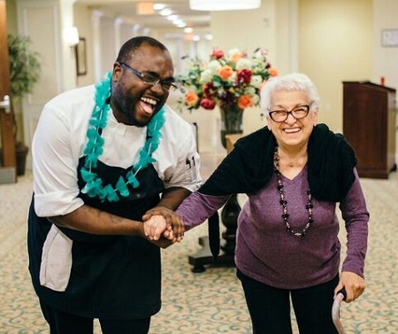 Senior Living Worker with a Senior