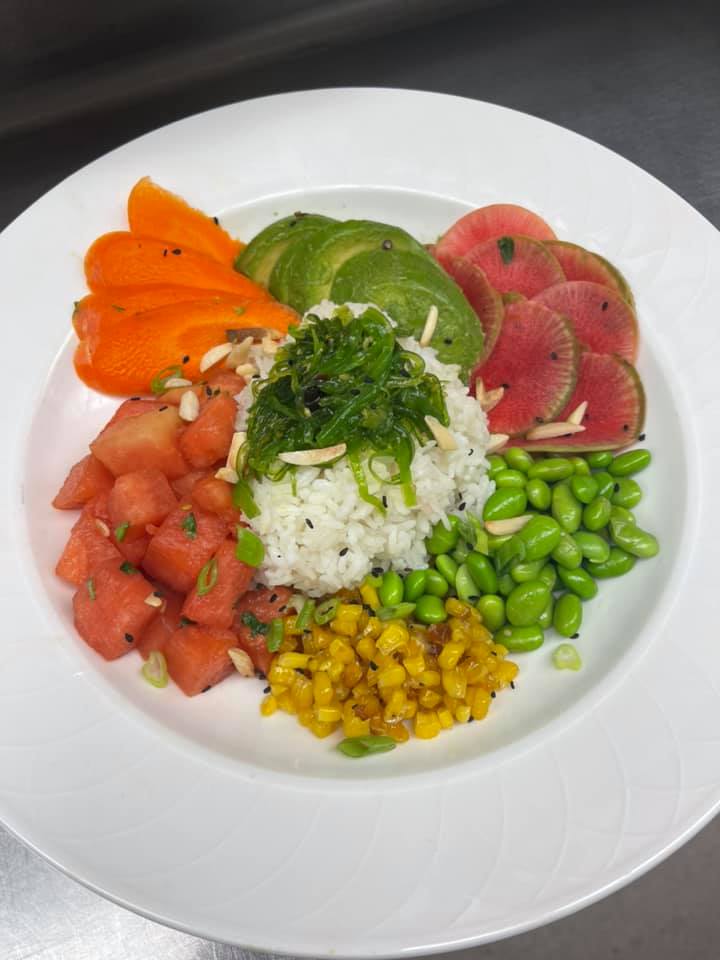 healthy bowl with rice, fruits, vegetables, leafy greens